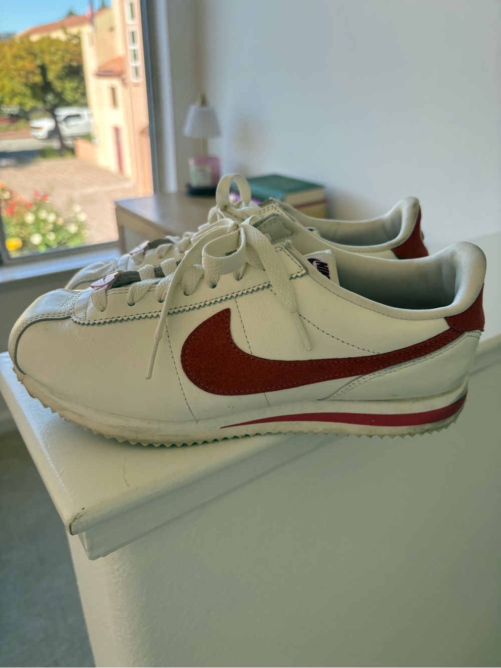 Nike Kids White Sneakers with Red Swoosh